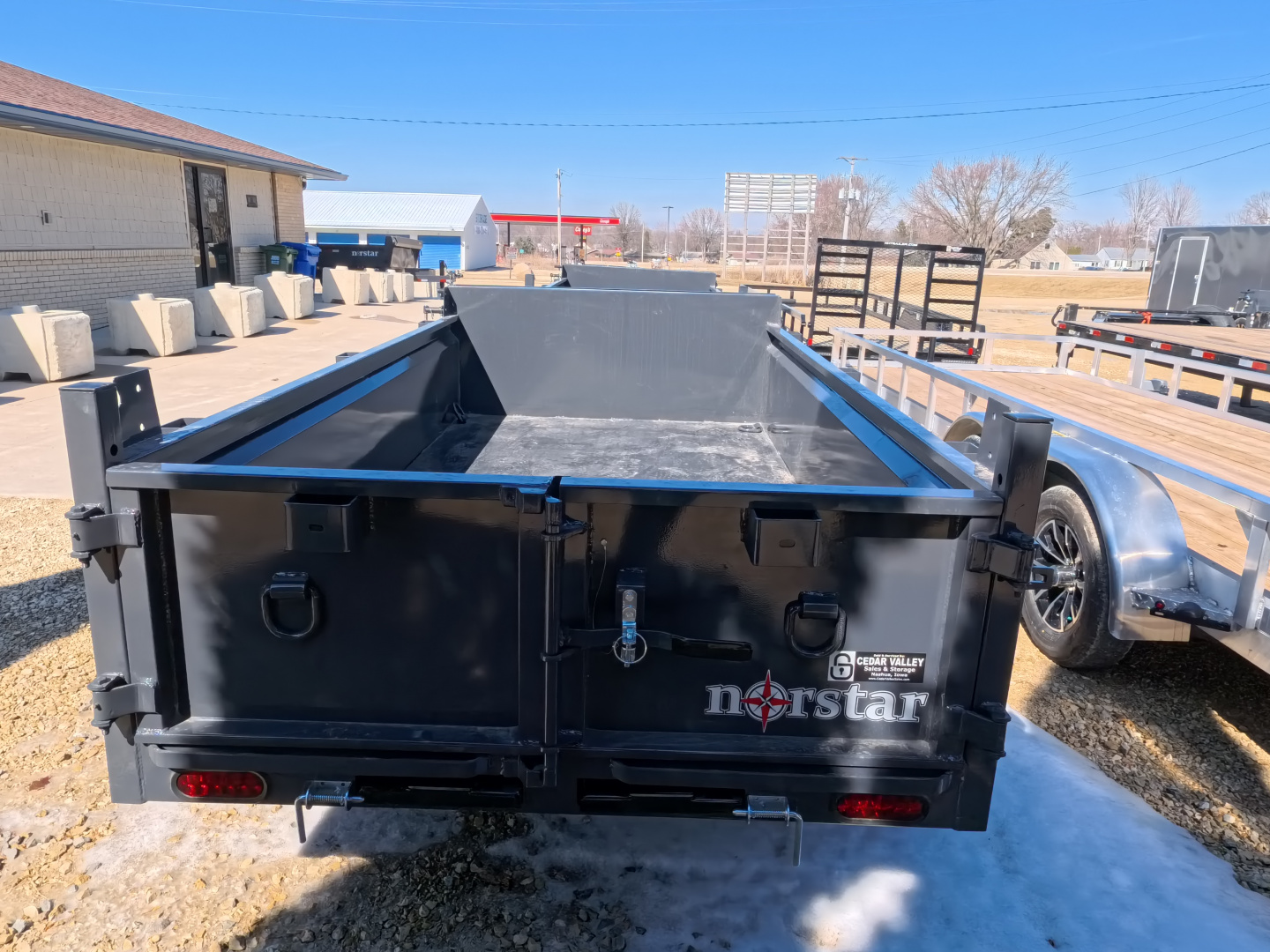 New 2026 Norstar 60 x 10 DCB Gray Dump Trailer with 7K GVWR, Power Up/Down Cylinder Only, 8 Ply ST205/75 R15 LRD Tires