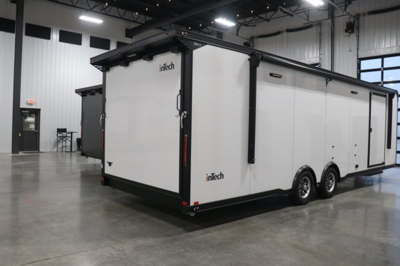 New In-Tech Lite 8.5x28 Race Trailer-10K White W/ Black Trim- L Base Cabinet, Generator Door, Tool Drawers, Winch, WW Cabinet, & A/C