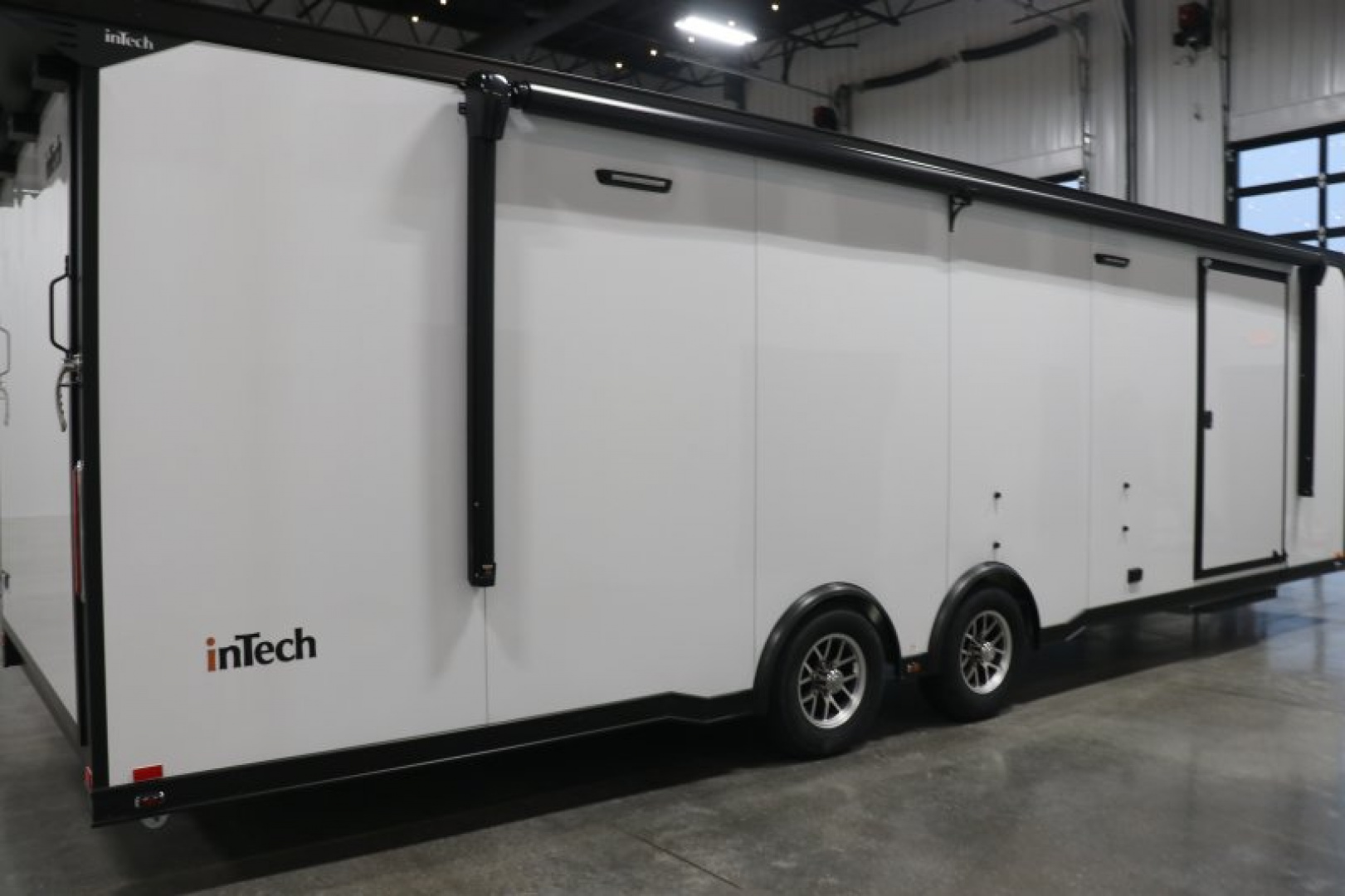 New In-Tech Lite 8.5x28 Race Trailer-10K White W/ Black Trim- L Base Cabinet, Generator Door, Tool Drawers, Winch, WW Cabinet, & A/C