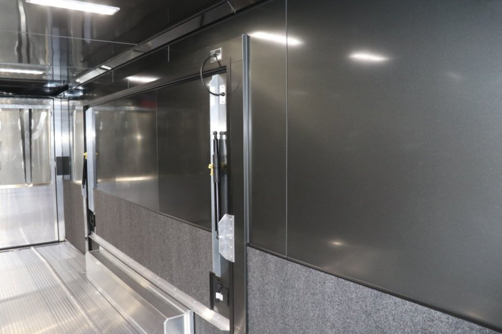 New In-Tech Lite 8.5x24 Race Trailer-10K Charcoal W/ Black Trim- L Base Cabinet, Generator Door, Tool Drawers, & WW Cabinet
