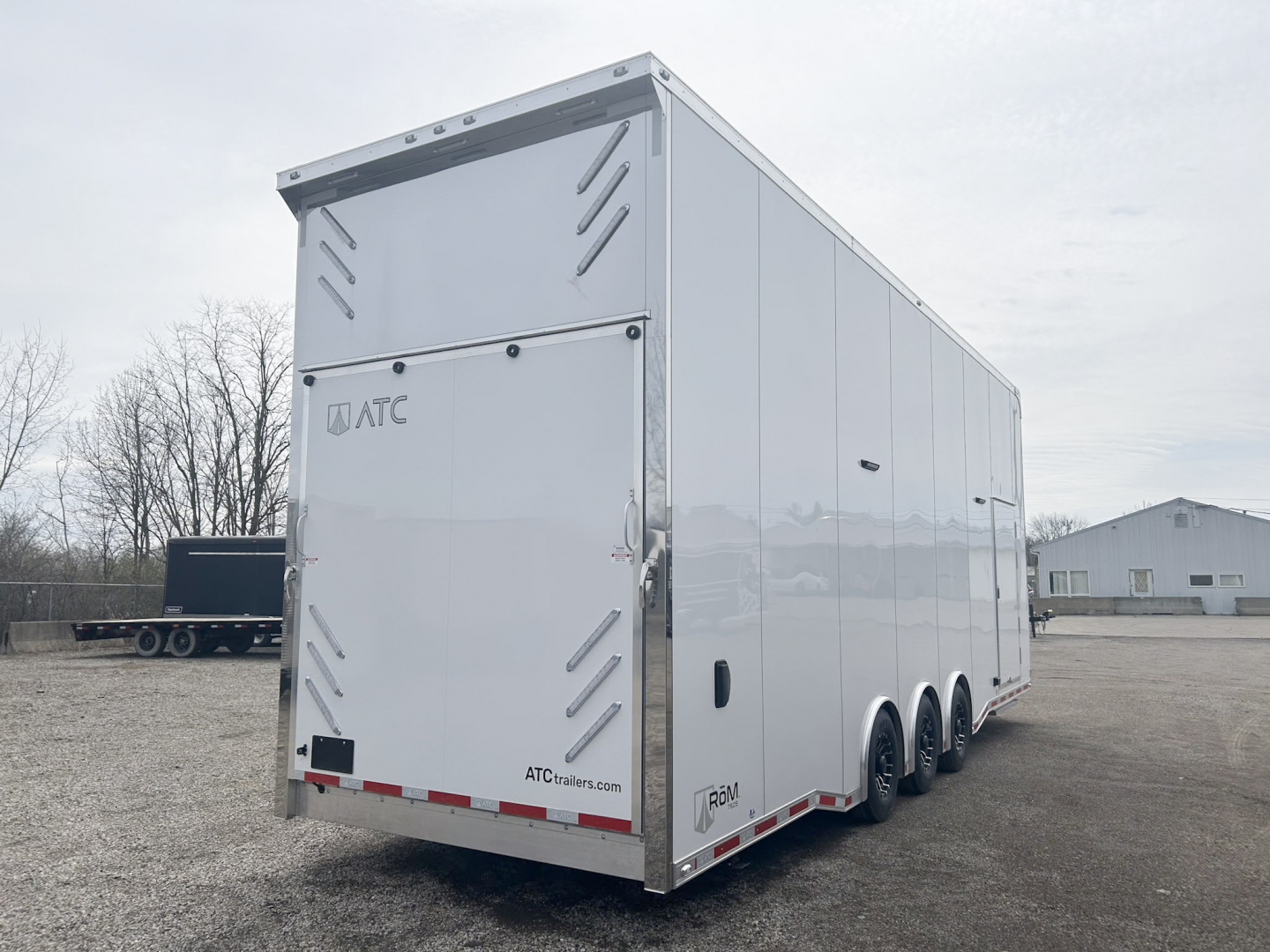 New 2026 ATC ROM 750 30 FT ALUMINUM STACKER TRAILER WITH PLUS PACKAGE ESCAPE DOOR