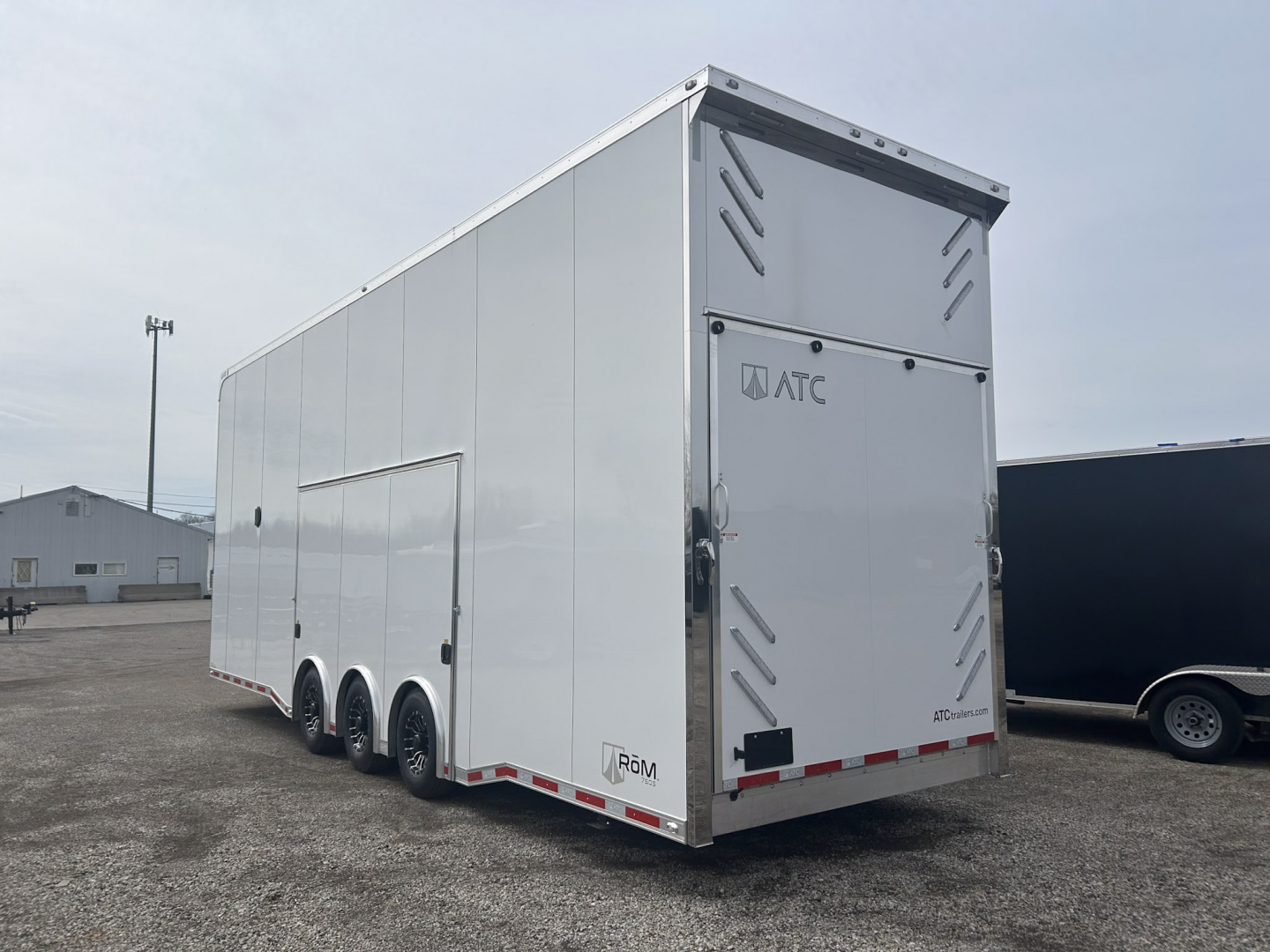 New 2026 ATC ROM 750 30 FT ALUMINUM STACKER TRAILER WITH PLUS PACKAGE ESCAPE DOOR
