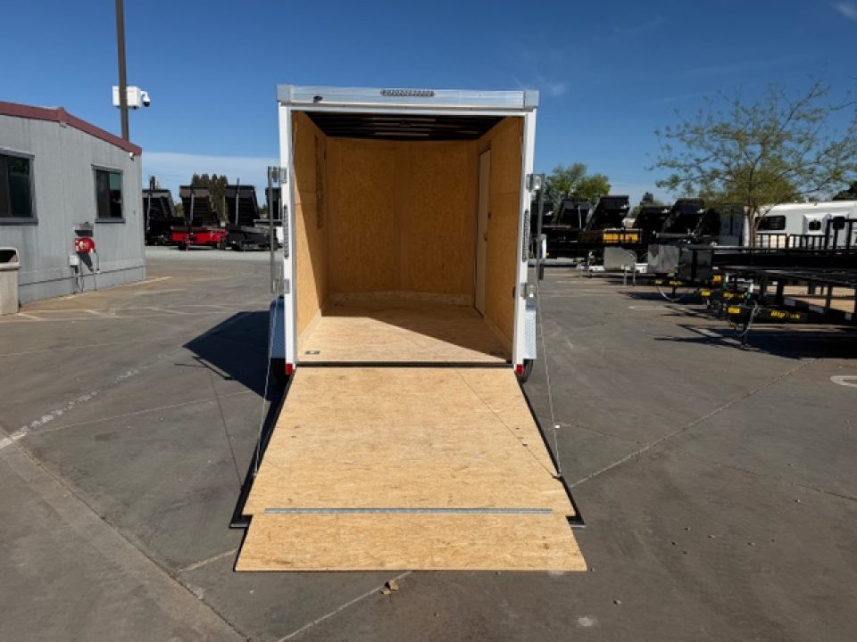 New 2026 Wells Cargo RFV610S2 6FT X 10FT 2990 GVW Cargo / Enclosed Trailer