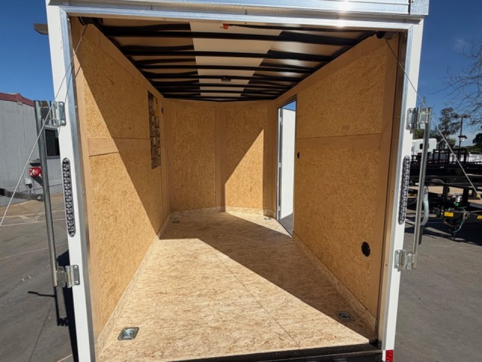 New 2026 Wells Cargo RFV610S2 6FT X 10FT 2990 GVW Cargo / Enclosed Trailer