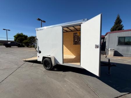 New 2026 Wells Cargo RFV610S2 6FT X 10FT 2990 GVW Cargo / Enclosed Trailer