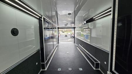 New 2026 Cargo Mate ELIMINATOR 8.5X34 Car / Racing Trailer