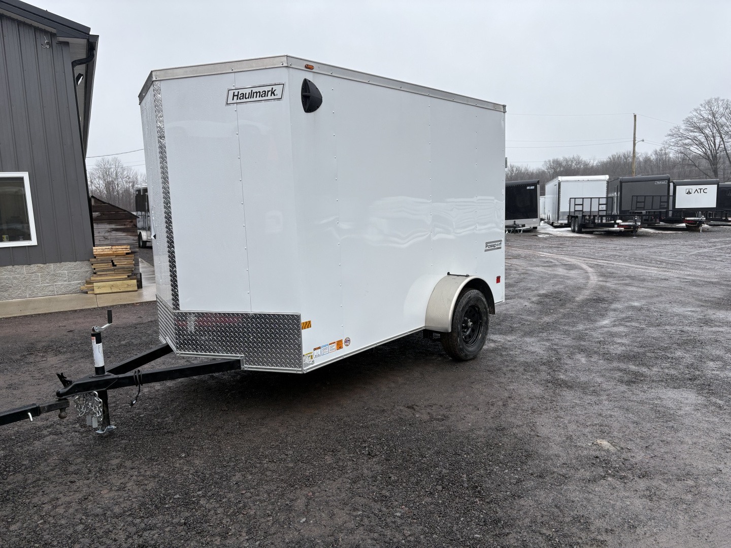 New 2026 Haulmark 6x10 6'6" Interior Passport Deluxe Cargo / Enclosed Trailer with Ramp Door