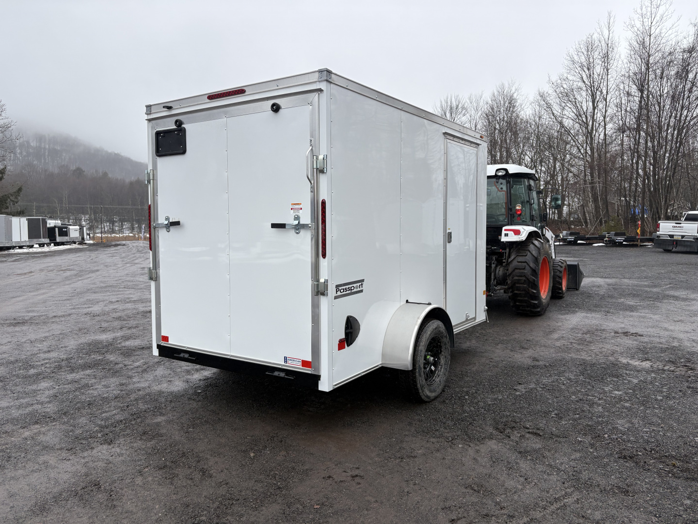 New 2026 Haulmark 6x10 6'6" Interior Passport Deluxe Cargo / Enclosed Trailer with Ramp Door