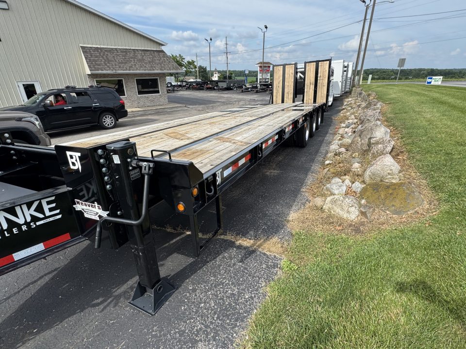 New 2026 Behnke FB8X33SDPT-50L Flatbed Trailer