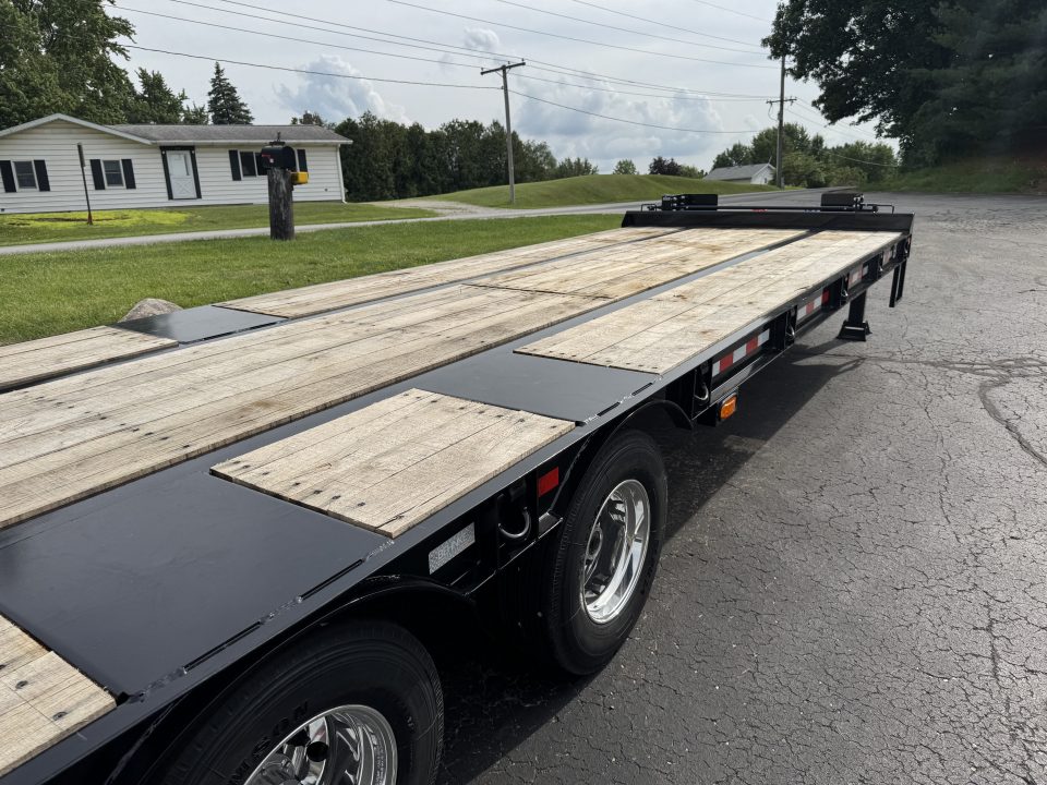 New 2026 Behnke FB8X33SDPT-50L Flatbed Trailer