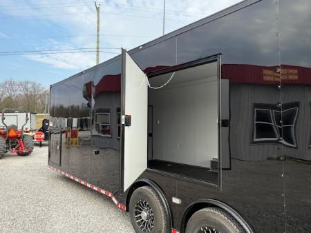 New Outlaw Light Race 8.5x30 12K Black Black-Out W/ Awning & Escape Door- RS Cab.