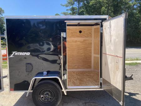 New 2026 Homesteader Trailer / Intrepid Series / 5x8 / 5'6" Interior Height / Single Swing Rear Door / 32" Side Door / 24" Stoneguard / .030 Black Aluminum