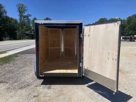 New 2026 Homesteader Trailer / Intrepid Series / 5x8 / 5'6" Interior Height / Single Swing Rear Door / 32" Side Door / 24" Stoneguard / Black Aluminum