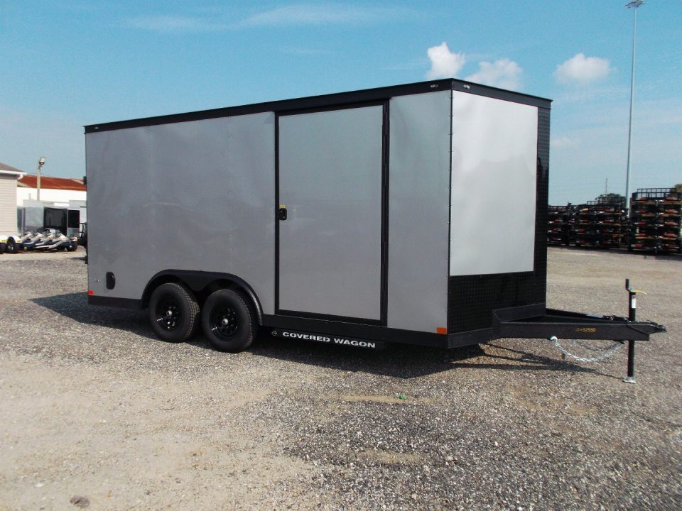 New 2026 Covered Wagon Trailers 8.5x16 Cargo Trailer / Car Hauler / 5200# Axles / 7ft Interior Height / 48" RV Side Door / Bed Lined RV Step / .080 Silver Semi-Screwless Exterior / 60" Triple Tube Tongue / Extra Wide Ramp / Black Out Package