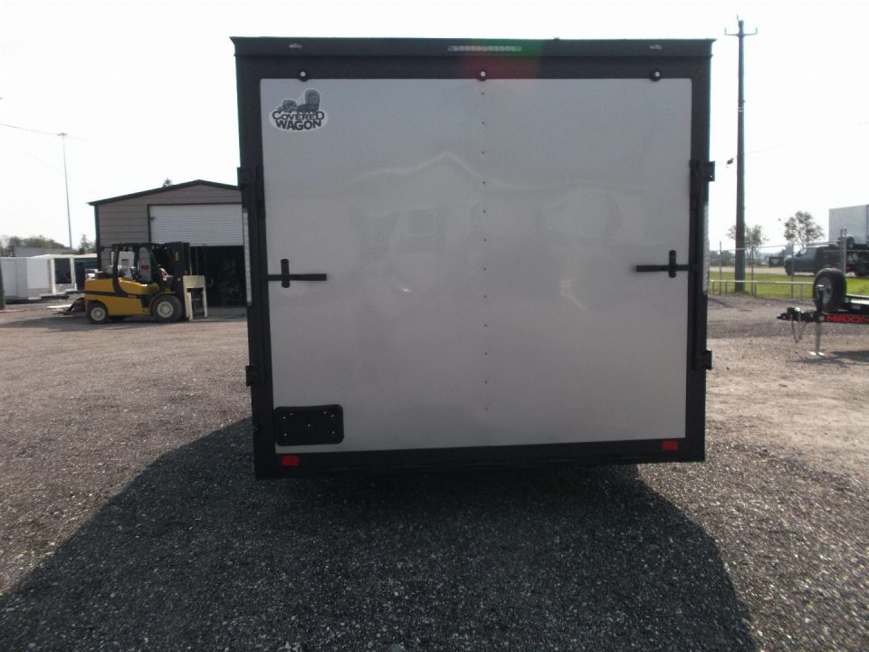 New 2026 Covered Wagon Trailers 8.5x16 Cargo Trailer / Car Hauler / 5200# Axles / 7ft Interior Height / 48" RV Side Door / Bed Lined RV Step / .080 Silver Semi-Screwless Exterior / 60" Triple Tube Tongue / Extra Wide Ramp / Black Out Package
