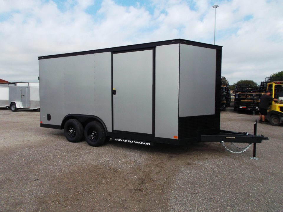 New 2026 Covered Wagon Trailers 8.5x16 Cargo Trailer / Car Hauler / 5200# Axles / 7ft Interior Height / 48" RV Side Door / Bed Lined RV Step / .080 Silver Semi-Screwless Exterior / 60" Triple Tube Tongue / Extra Wide Ramp / Black Out Package