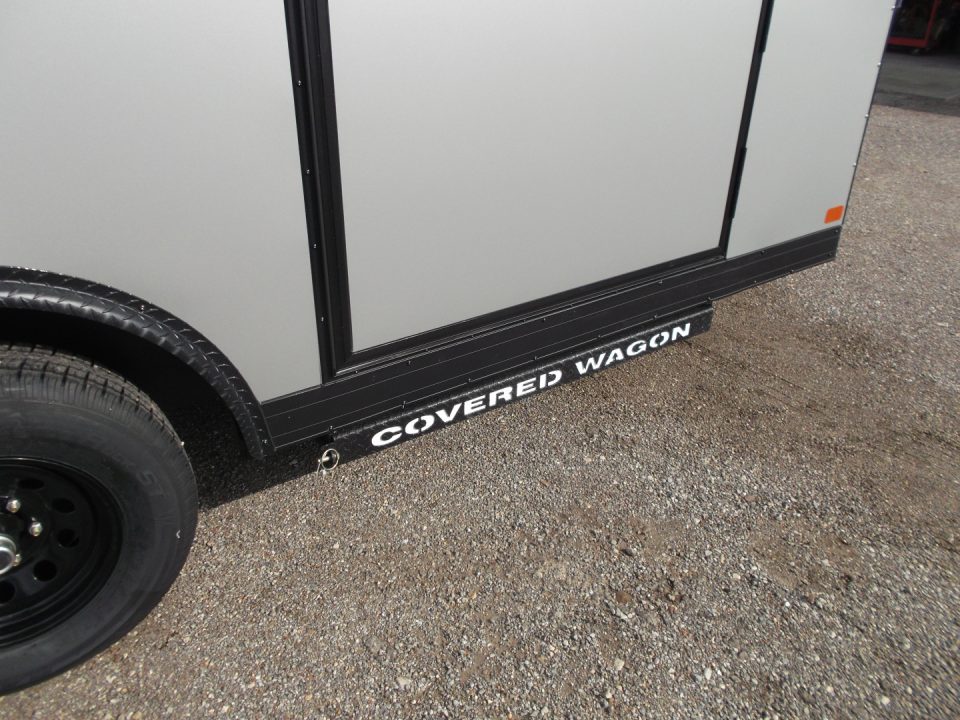 New 2026 Covered Wagon Trailers 8.5x16 Cargo Trailer / Car Hauler / 5200# Axles / 7ft Interior Height / 48" RV Side Door / Bed Lined RV Step / .080 Silver Semi-Screwless Exterior / 60" Triple Tube Tongue / Extra Wide Ramp / Black Out Package