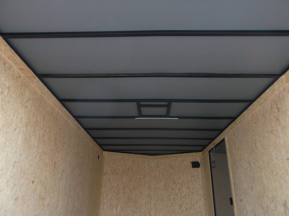 New 2026 Covered Wagon Trailers 8.5x16 Cargo Trailer / Car Hauler / 5200# Axles / 7ft Interior Height / 48" RV Side Door / Bed Lined RV Step / .080 Silver Semi-Screwless Exterior / 60" Triple Tube Tongue / Extra Wide Ramp / Black Out Package