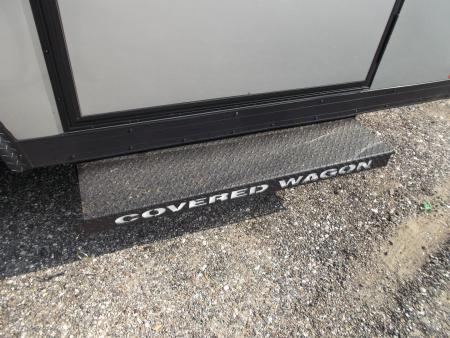 New 2026 Covered Wagon Trailers 8.5x16 Cargo Trailer / Car Hauler / 5200# Axles / 7ft Interior Height / 48" RV Side Door / Bed Lined RV Step / .080 Silver Semi-Screwless Exterior / 60" Triple Tube Tongue / Extra Wide Ramp / Black Out Package