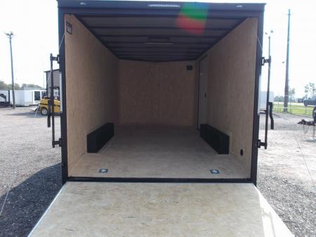 New 2026 Covered Wagon Trailers 8.5x16 Cargo Trailer / Car Hauler / 5200# Axles / 7ft Interior Height / 48" RV Side Door / Bed Lined RV Step / .080 Silver Semi-Screwless Exterior / 60" Triple Tube Tongue / Extra Wide Ramp / Black Out Package