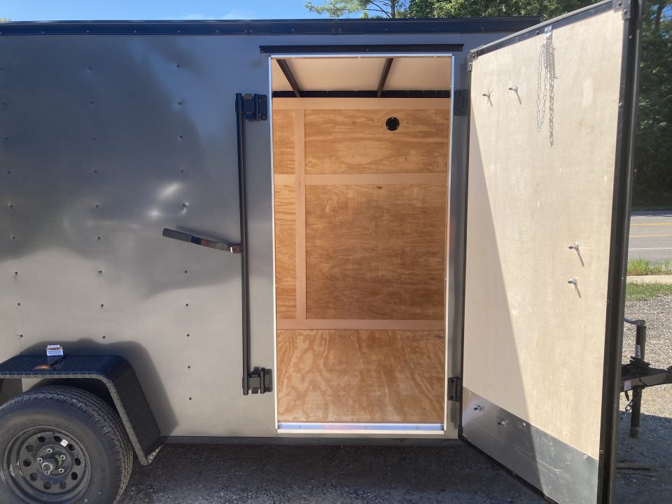 New 2026 Homesteader Trailer / 612IS / 6' wide x 12' Long / 32" Side Door / Ramp Rear Door / 6' Interior Height / .030 Gray Aluminum/ Blacked Out Package