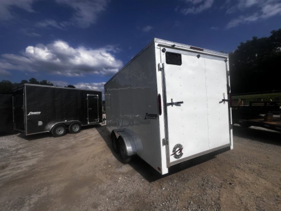 New 2026 Homesteader Trailers / 714IT Intrepid / 6'6"" Interior Height / .030 White Aluminum / Ramp Rear Door / 32" Side Door