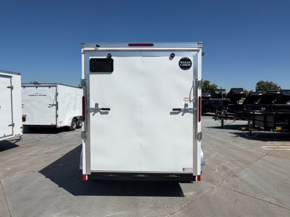New 2026 Wells Cargo FT612T2-D 6FT X 12FT 7K GVW Cargo / Enclosed Trailer