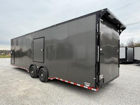 New Outlaw Light Race 8.5x30 12K Charcoal Black-Out W/ Awning & Escape Door W/ RS CABINETS