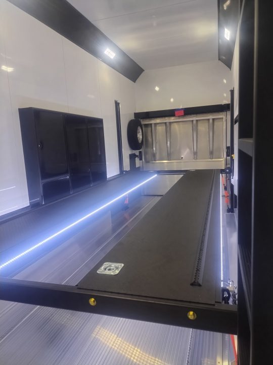 New In-Tech Lite 8.5x32 Stacker Race Trailer-21K- Sportsman Gray W/ Black Trim, Escape Door, WW Cabinet, L Cabinet, & Winch