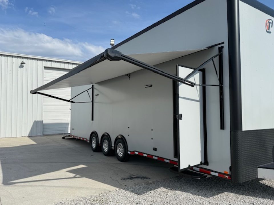 New In-Tech Lite 8.5x32 Stacker Race Trailer-21K- Sportsman Gray W/ Black Trim, Escape Door, WW Cabinet, L Cabinet, & Winch