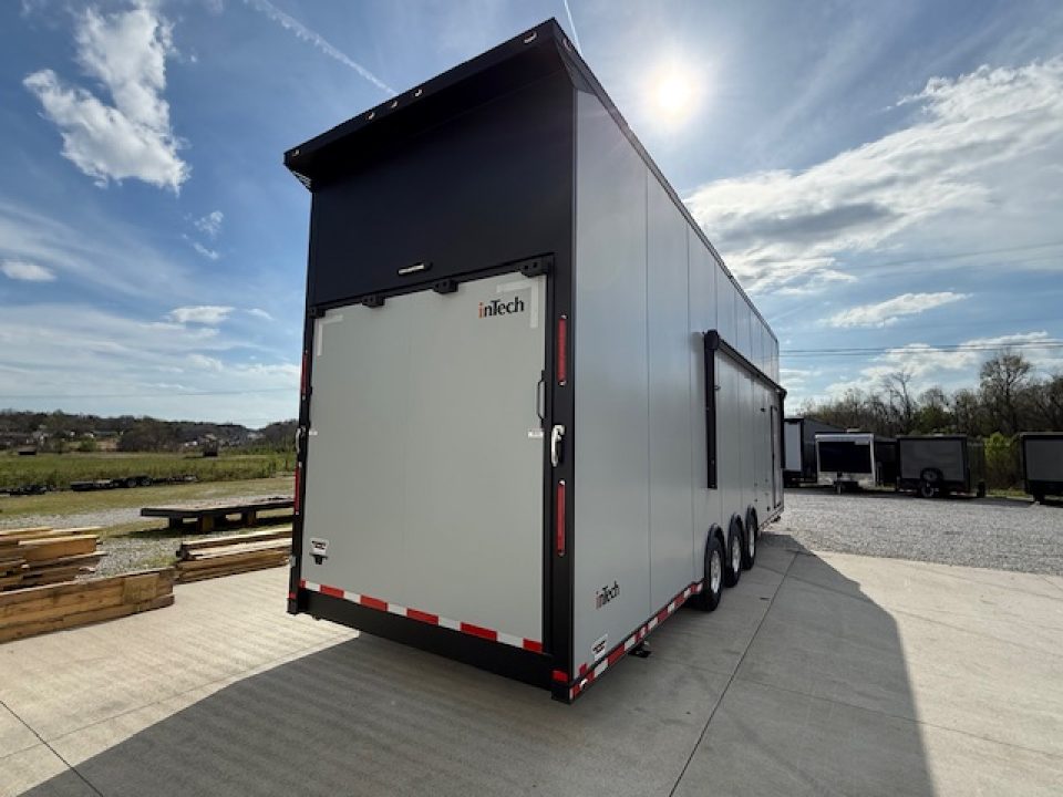 New In-Tech Lite 8.5x32 Stacker Race Trailer-21K- Sportsman Gray W/ Black Trim, Escape Door, WW Cabinet, L Cabinet, & Winch