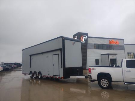 New In-Tech Lite 8.5x32 Stacker Race Trailer-21K- Sportsman Gray W/ Black Trim, Escape Door, WW Cabinet, L Cabinet, & Winch