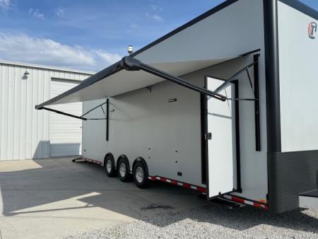 New In-Tech Lite 8.5x32 Stacker Race Trailer-21K- Sportsman Gray W/ Black Trim, Escape Door, WW Cabinet, L Cabinet, & Winch