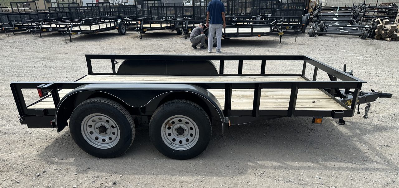 New 2025 Road Boss 77"x12' Tandem Axle Bumper Pull with Slide in Ramps Utility Trailer