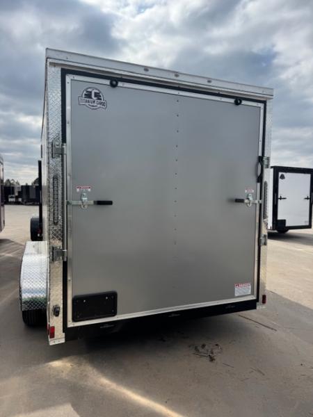 New 2026 Titanium 7x14 TA Cargo / Enclosed Trailer Silver Frost Polycore Black Mod Wheels