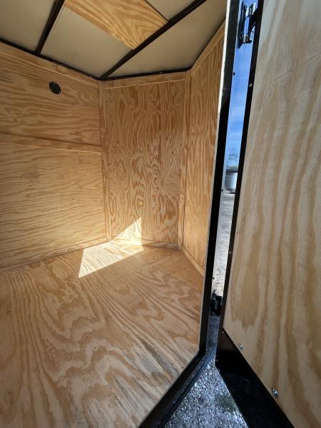 New 2026 Family Trailer 6x12 Tandem Axle Cargo / Enclosed Trailer- Screwless Exterior- Blackout pkg- Rear Spoiler- HD Axle