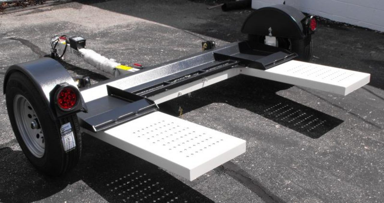 New NEW  Stehl       Tow Dolly     80"  Straps Included  ELECTRIC BRAKES