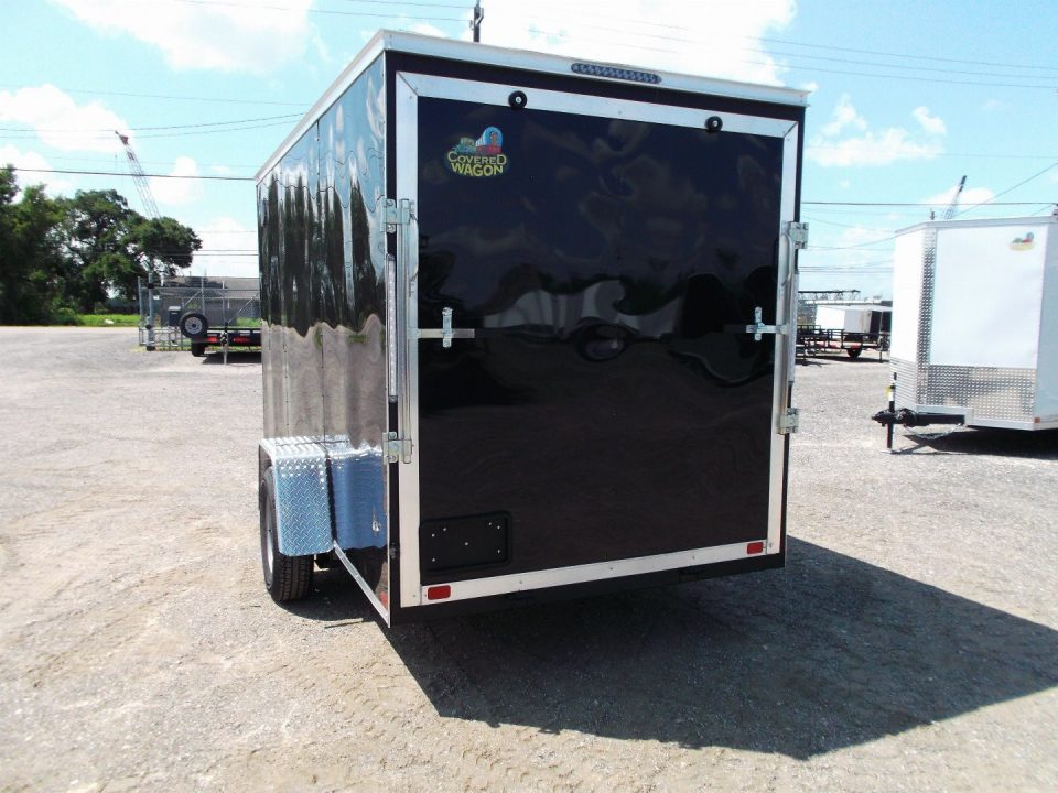 New 2026 Covered Wagon Trailers 6x12 Cargo / Enclosed Trailer / Extra Wide Ramp / 36" RV Side Door / 6'6" Interior / Bed Lined Tongue and Frame / (4) D-Rings / .030 Black Semi-Screwless Exterior