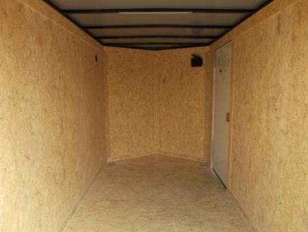 New 2026 Covered Wagon Trailers 6x12 Cargo / Enclosed Trailer / Extra Wide Ramp / 36" RV Side Door / 6'6" Interior / Bed Lined Tongue and Frame / (4) D-Rings / .030 Black Semi-Screwless Exterior