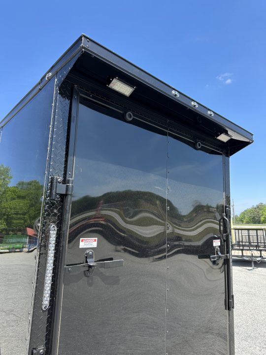 New 2026 6X12 SINGLE AXLE ENCLOSED TRAILER WITH REAR SPOILER, BLACKOUT PACKAGE AND 7' ROOF