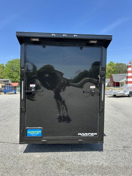New 2026 6X12 SINGLE AXLE ENCLOSED TRAILER WITH REAR SPOILER, BLACKOUT PACKAGE AND 7' ROOF