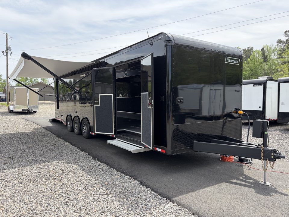 New 2026 Haulmark 34 Bathoom Race Trailer, Air Prep PKG, Awning, Polycor, Insulated, Window, 54" ALX Slide Out Step, A/C + Heat