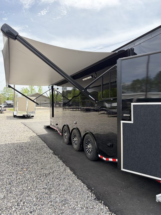 New 2026 Haulmark 34 Bathoom Race Trailer, Air Prep PKG, Awning, Polycor, Insulated, Window, 54" ALX Slide Out Step, A/C + Heat