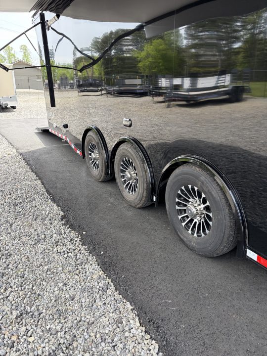 New 2026 Haulmark 34 Bathoom Race Trailer, Air Prep PKG, Awning, Polycor, Insulated, Window, 54" ALX Slide Out Step, A/C + Heat