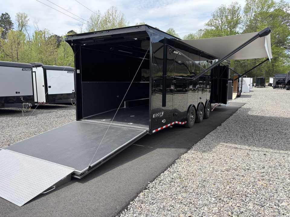 New 2026 Haulmark 34 Bathoom Race Trailer, Air Prep PKG, Awning, Polycor, Insulated, Window, 54" ALX Slide Out Step, A/C + Heat