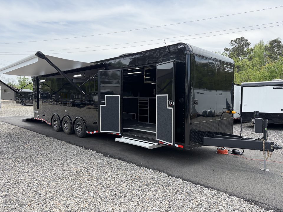 New 2026 Haulmark 34 Bathoom Race Trailer, Air Prep PKG, Awning, Polycor, Insulated, Window, 54" ALX Slide Out Step, A/C + Heat