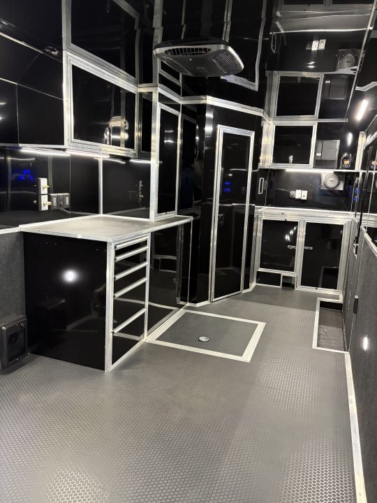 New 2026 Haulmark 34 Bathoom Race Trailer, Air Prep PKG, Awning, Polycor, Insulated, Window, 54" ALX Slide Out Step, A/C + Heat