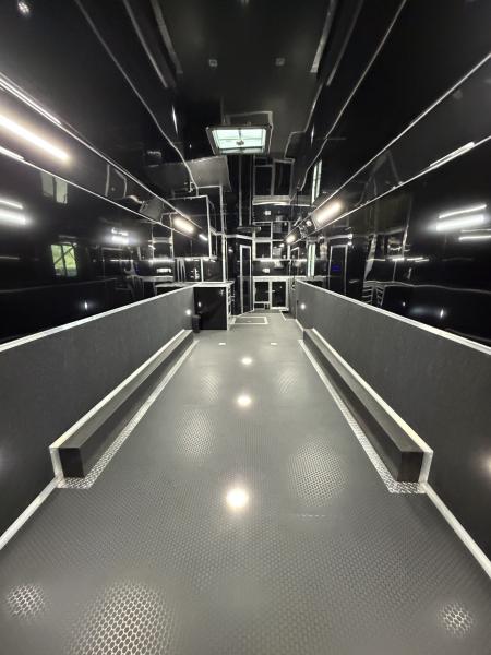 New 2026 Haulmark 34 Bathoom Race Trailer, Air Prep PKG, Awning, Polycor, Insulated, Window, 54" ALX Slide Out Step, A/C + Heat