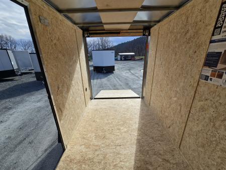 New 2026 Cargo Express 6x10 3K Enclosed Trailer- 6.5" Interior Height- Ramp door- Blackout Trim- Black Alloy Wheels- 24" OC Floor Wall and Roof-