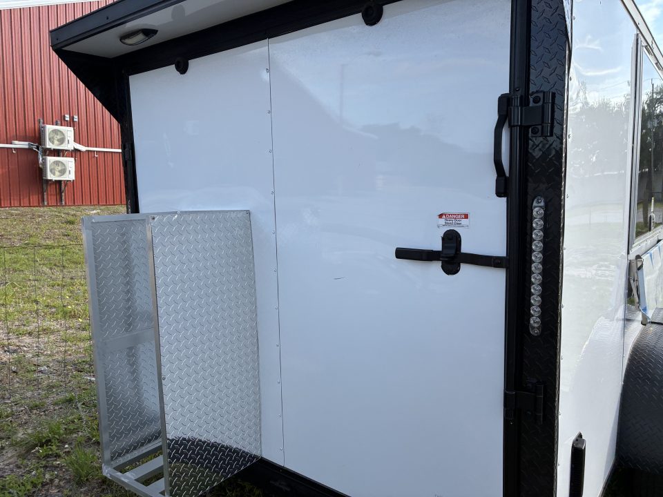 Used 2025 Cargo United LLC Food Truck 7 x 12 Dual Axle White with Blackout Package and Rear Wing with LED Lights Enclosed Trailer